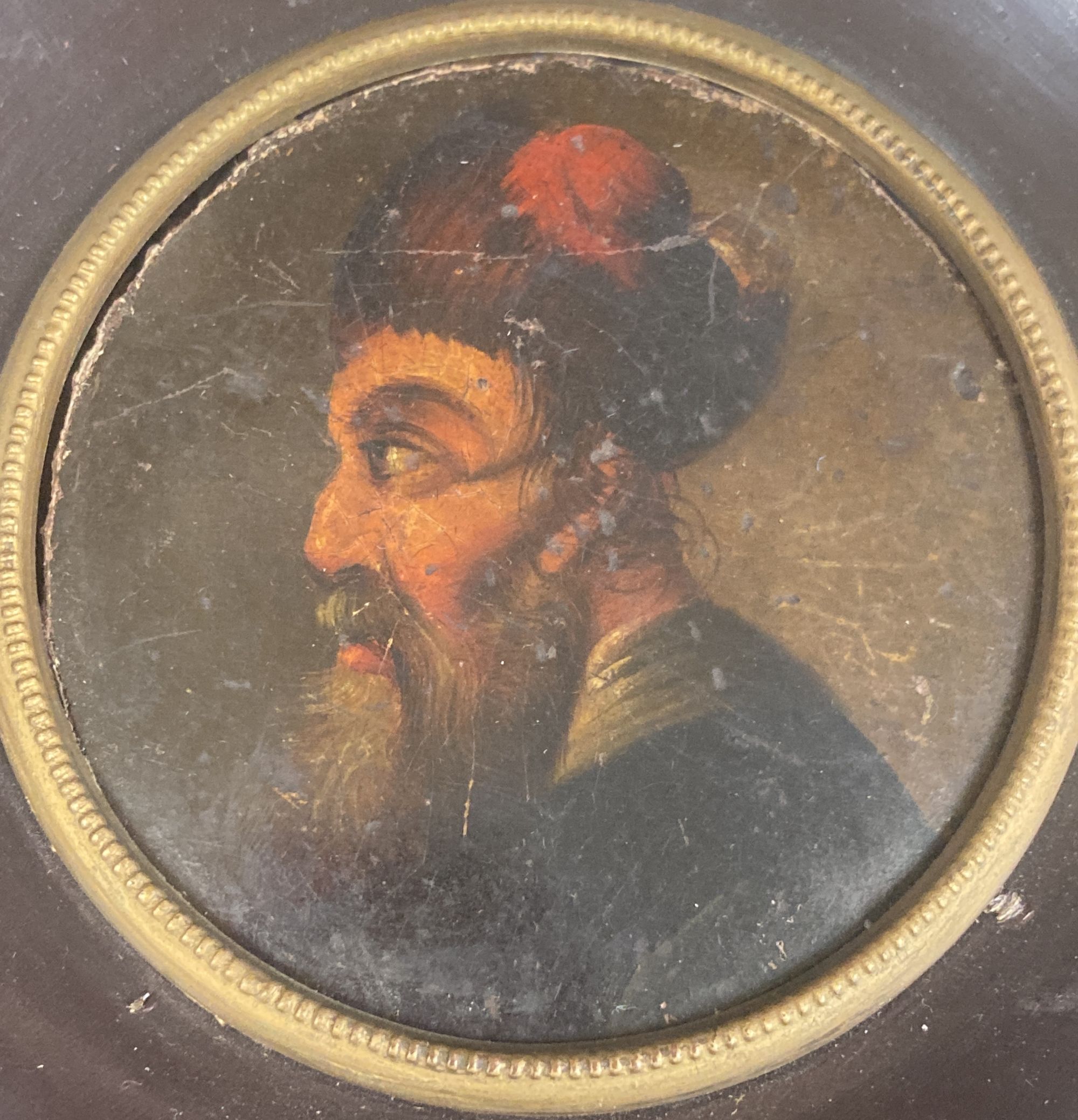 19th century Continental School (Stobwasser), oil on papier mache, Portrait of Turk, probably once a snuff box lid, tondo, 8cm